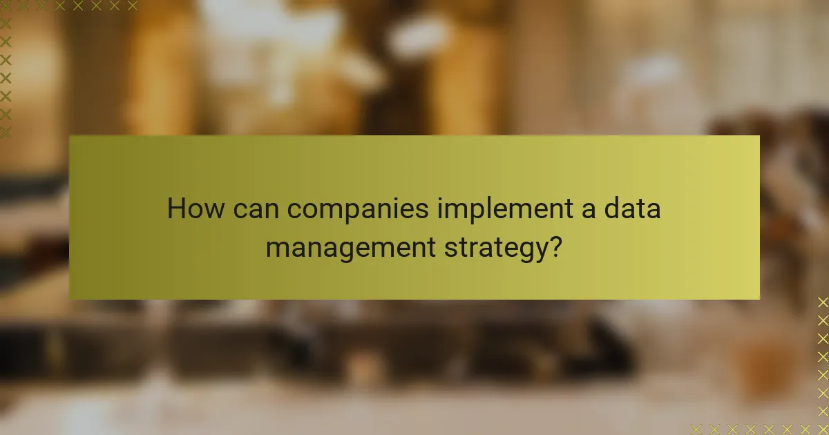 How can companies implement a data management strategy?